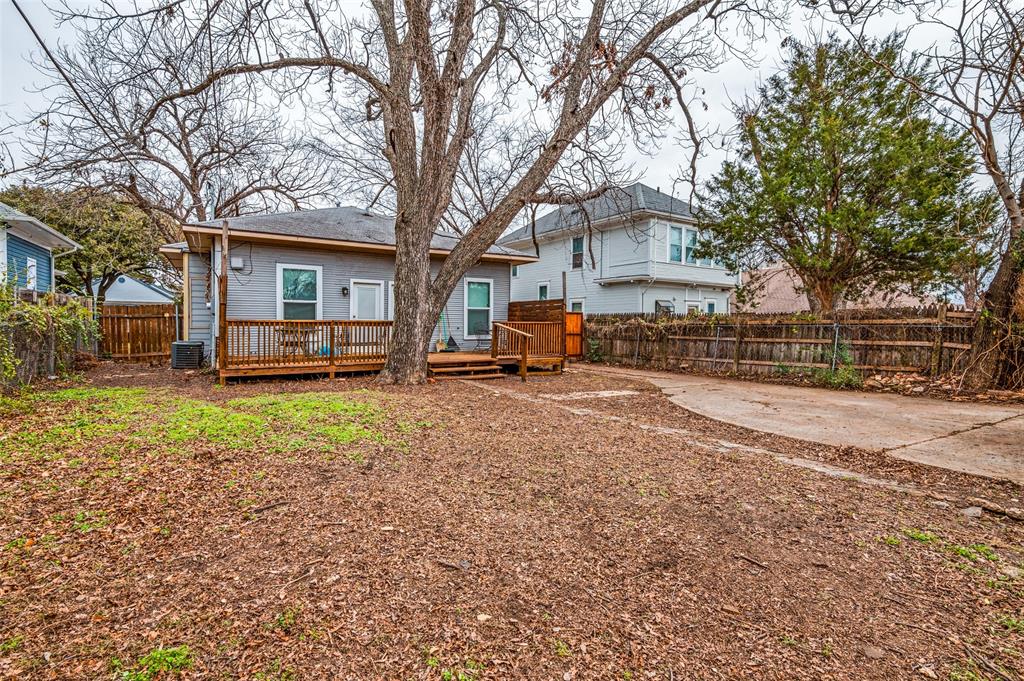 617 Haines Avenue Dallas, TX 75208 - Photo 8 of 29 a view of a house with a yard