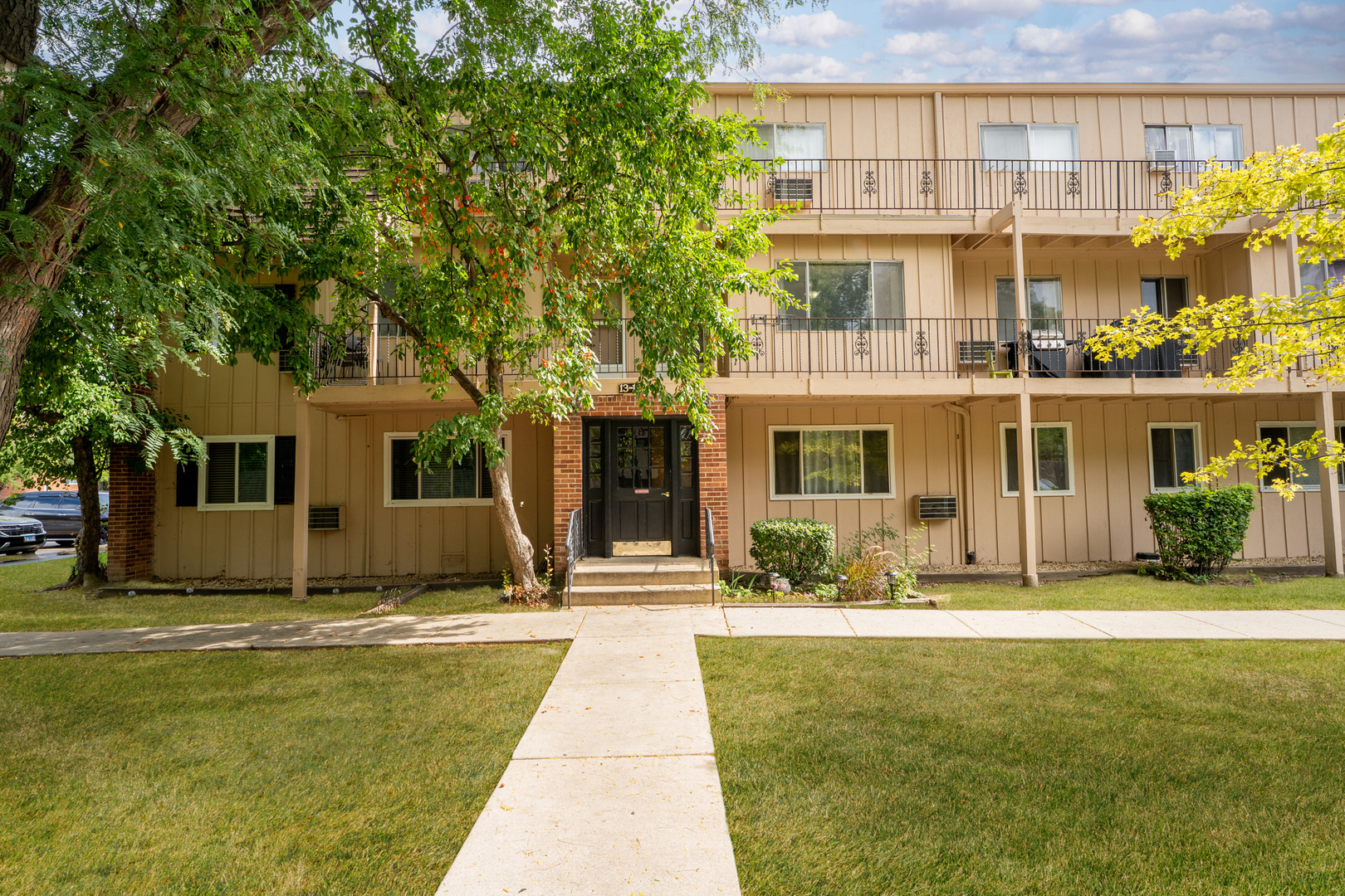 a view of a building with a swimming pool