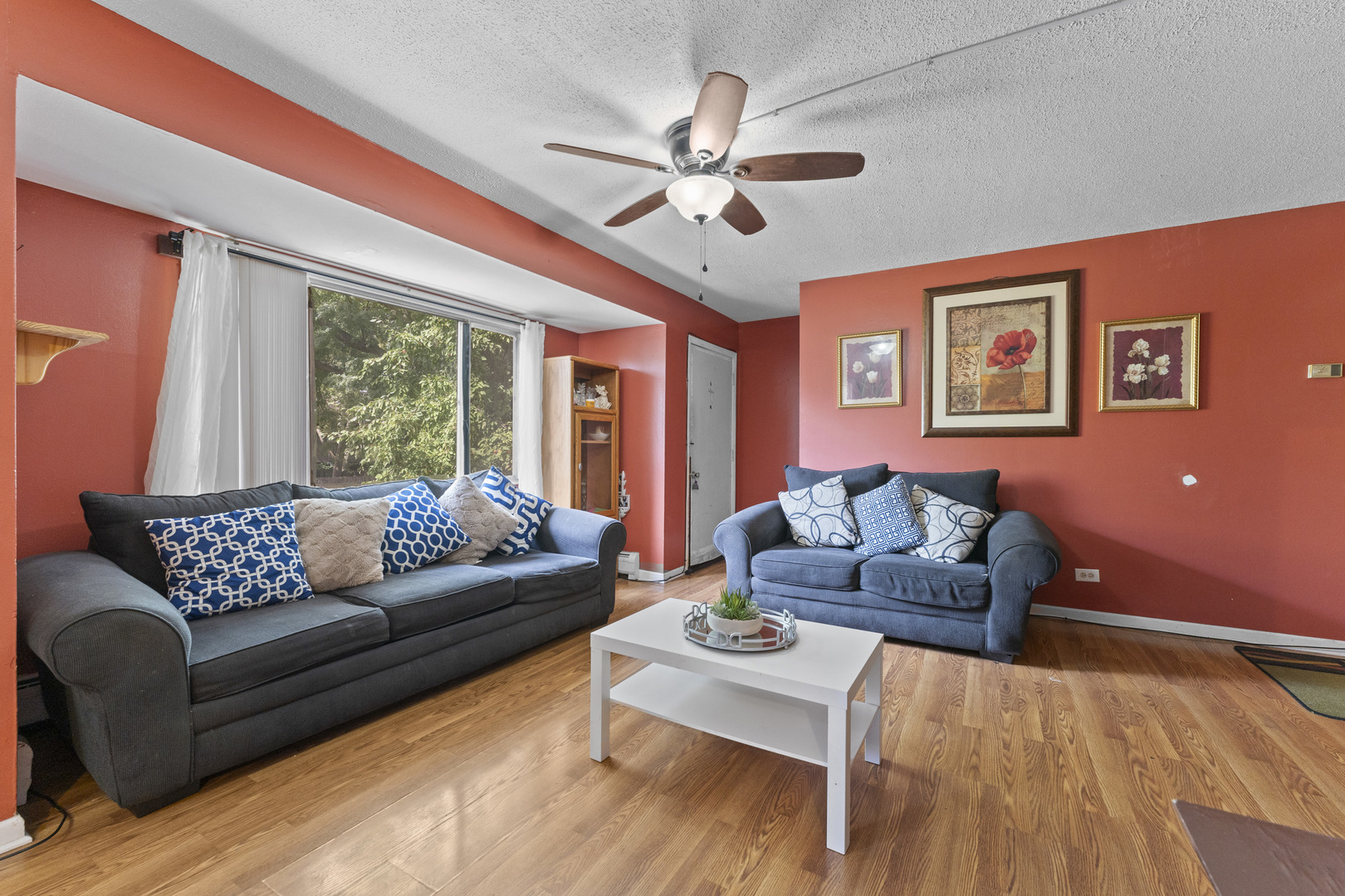 2504 West Algonquin Road, Unit 14 Rolling Meadows, IL 60008 - Photo 6 of 20 a living room with furniture and a large window