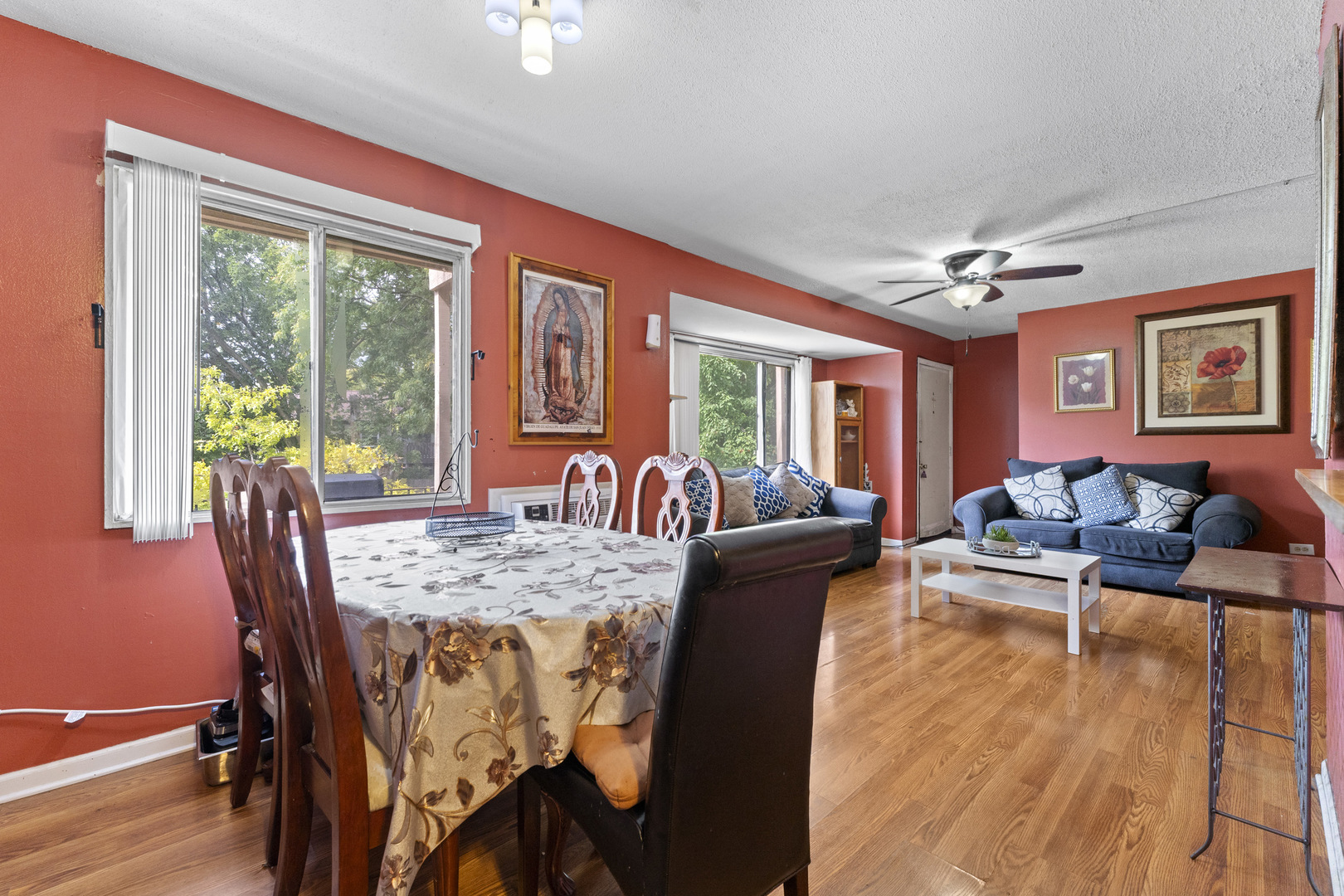 2504 West Algonquin Road, Unit 14 Rolling Meadows, IL 60008 - Photo 9 of 20 a view of a dining room with furniture window and wooden floor