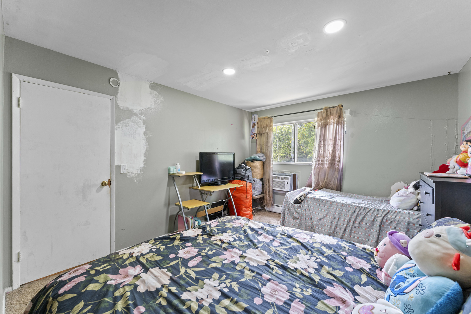 2504 West Algonquin Road, Unit 14 Rolling Meadows, IL 60008 - Photo 10 of 20 a bedroom with bed and a window