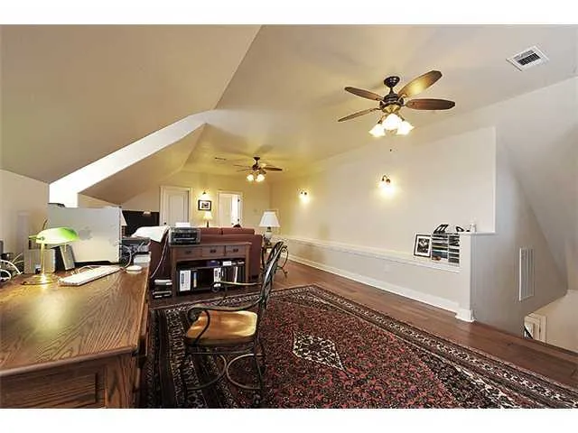a living room with lots of furniture and view