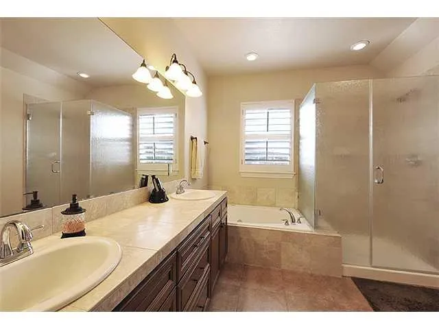 a bedroom with furniture and a bed