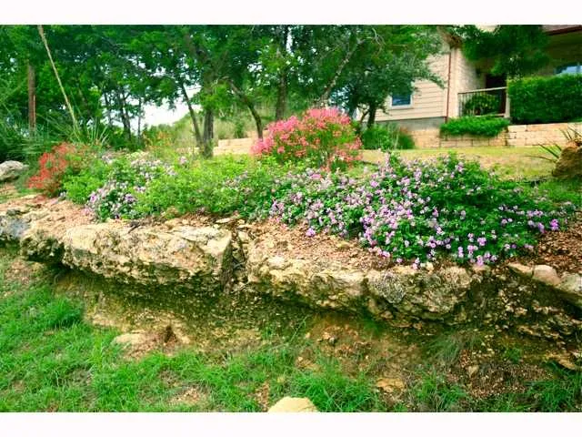 a view of a house with a snow in the yard