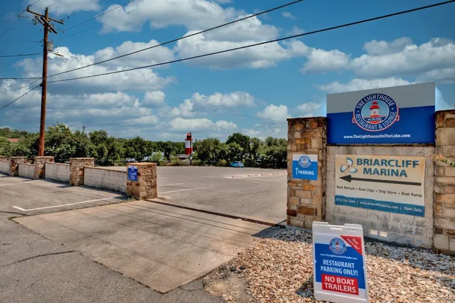 a view of a lake with sitting space