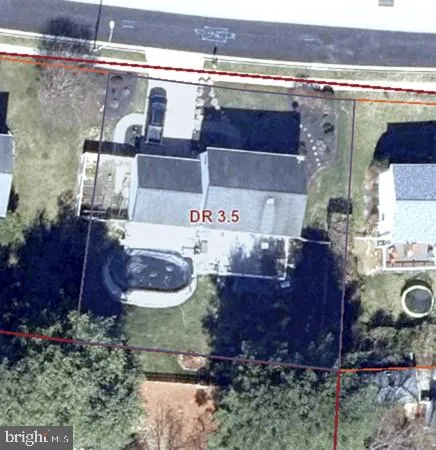 a view of a deck with wooden floor and outdoor seating