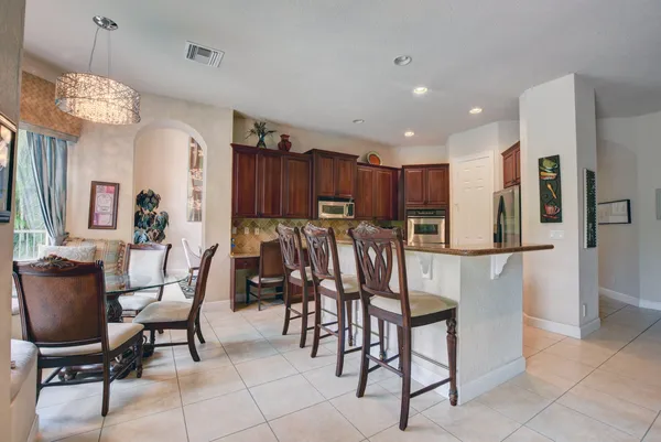 a view of a dining room with furniture