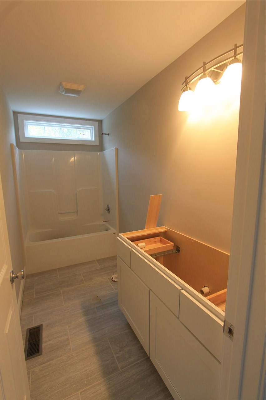 855 Battlefield Road Fort Defiance, VA 24437 - Photo 3 of 29 a bathroom with a bathtub and shower
