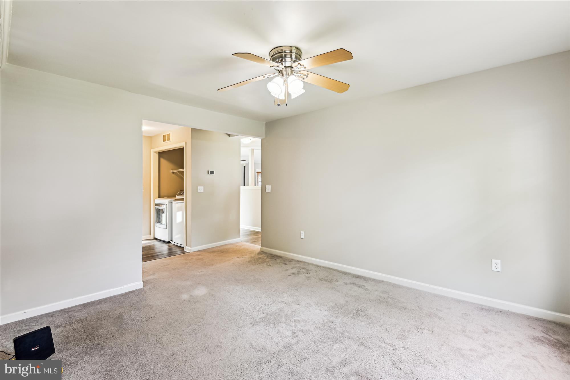4012 Ramsey Drive Edgewater, MD 21037 - Photo 18 of 77 an empty room with closet and a ceiling fan