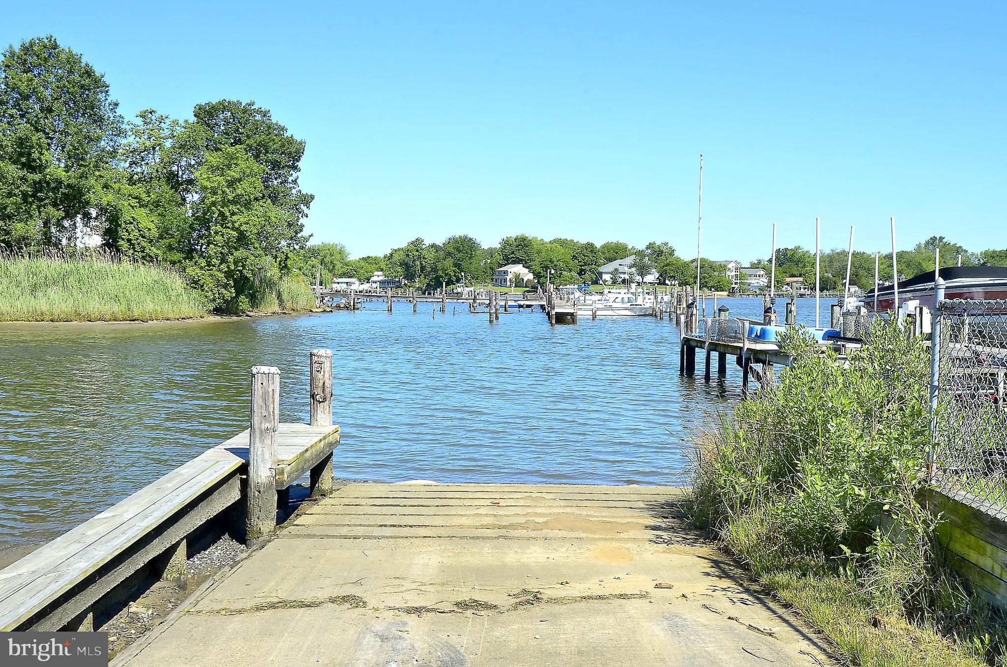 4012 Ramsey Drive Edgewater, MD 21037 - Photo 61 of 77 a view of a lake with sitting area