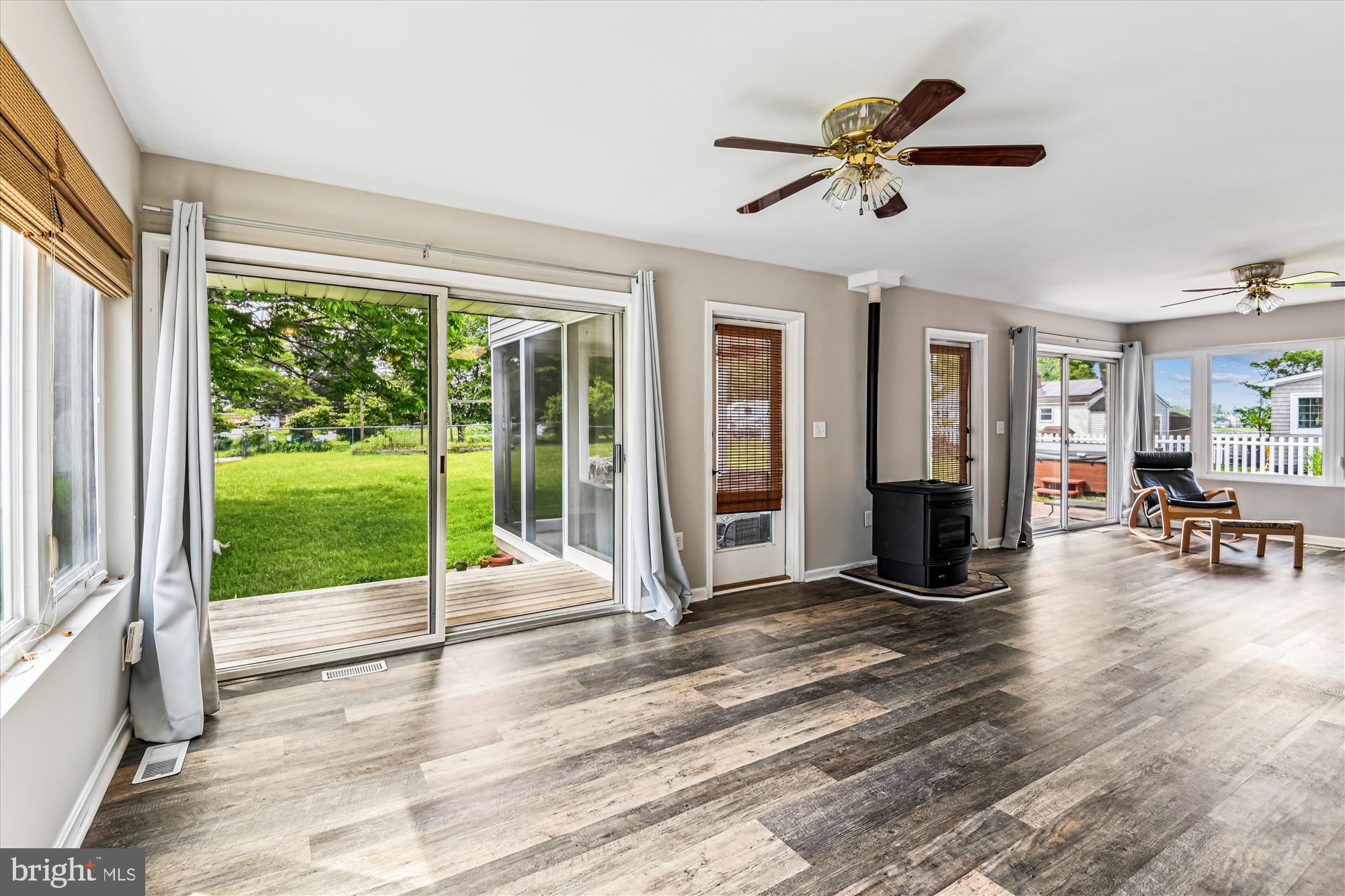 4012 Ramsey Drive Edgewater, MD 21037 - Photo 9 of 77 a view of an empty room and window with a ceiling fan