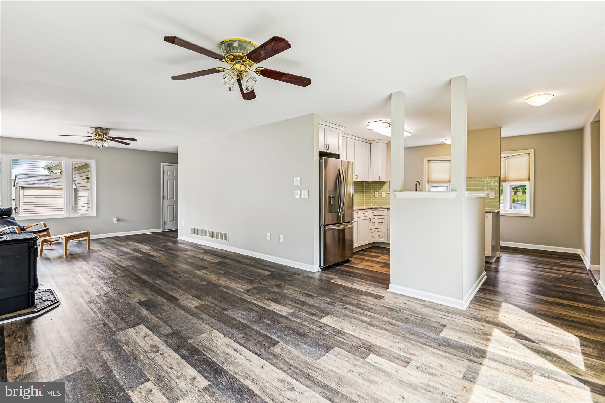 4012 Ramsey Drive Edgewater, MD 21037 - Photo 10 of 77 a view of a kitchen with a refrigerator and a stove top oven