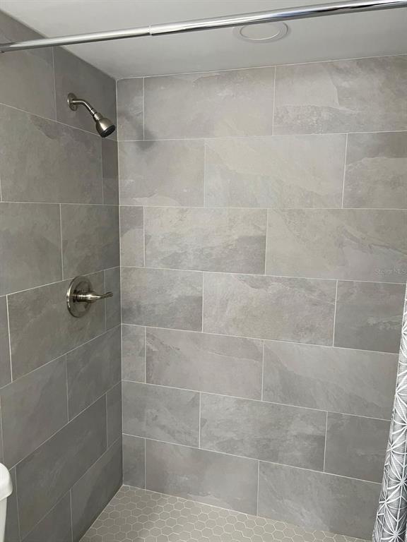 1324 South Pine Ridge Circle, Unit D2 Sanford, FL 32773 - Photo 11 of 15 a bathroom with a shower