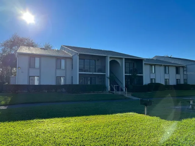 a view of house with garden