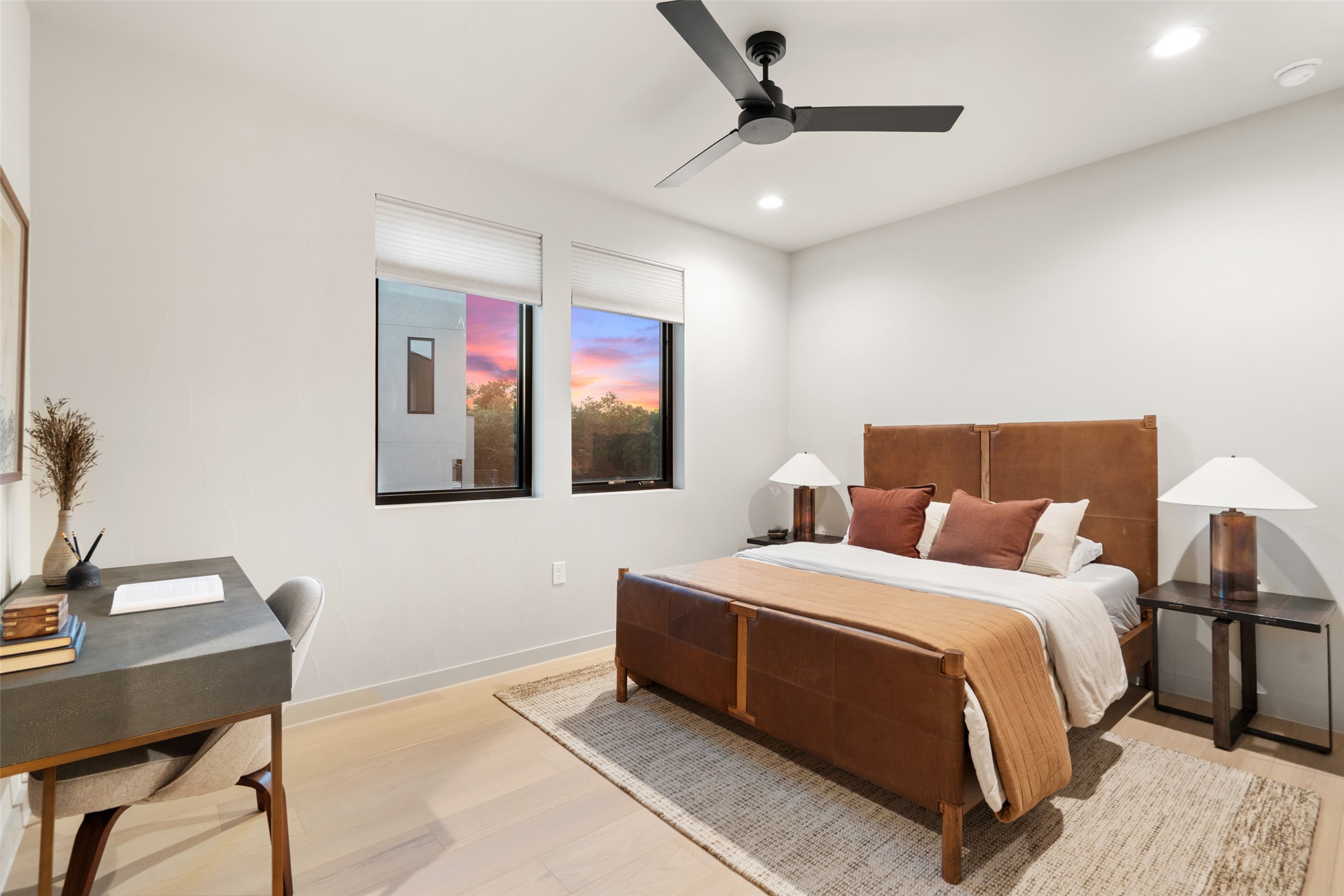 9803 Ribelin Ranch Court, Unit 6 Austin, TX 78750 - Photo 25 of 31 Minimalist design and abundant daylight define this airy bedroom retreat.