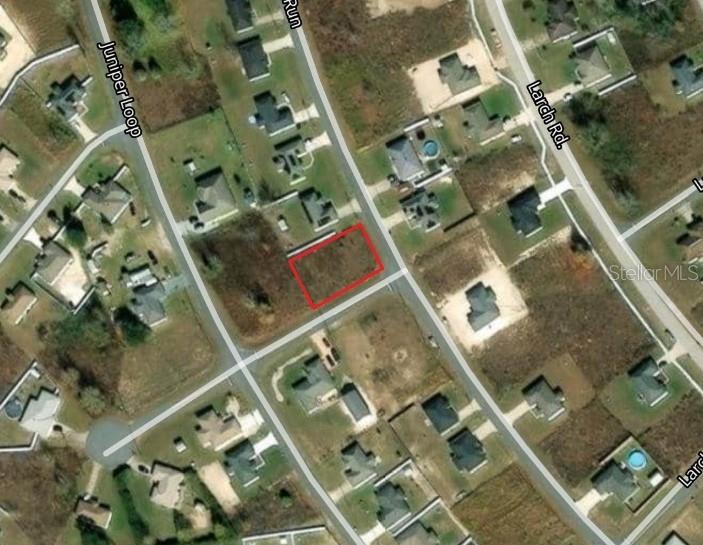 Juniper Run, Unit 128 Ocala, FL 34480 - Photo 1 of 1 an aerial view of multiple houses