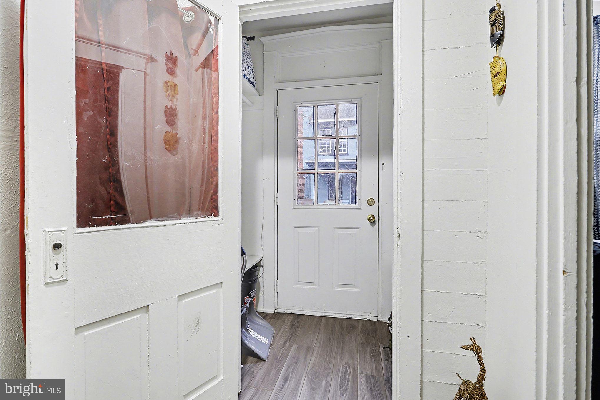 124 South Arch Street Lancaster, PA 17603 - Photo 6 of 34 a view of an entryway with wooden floor