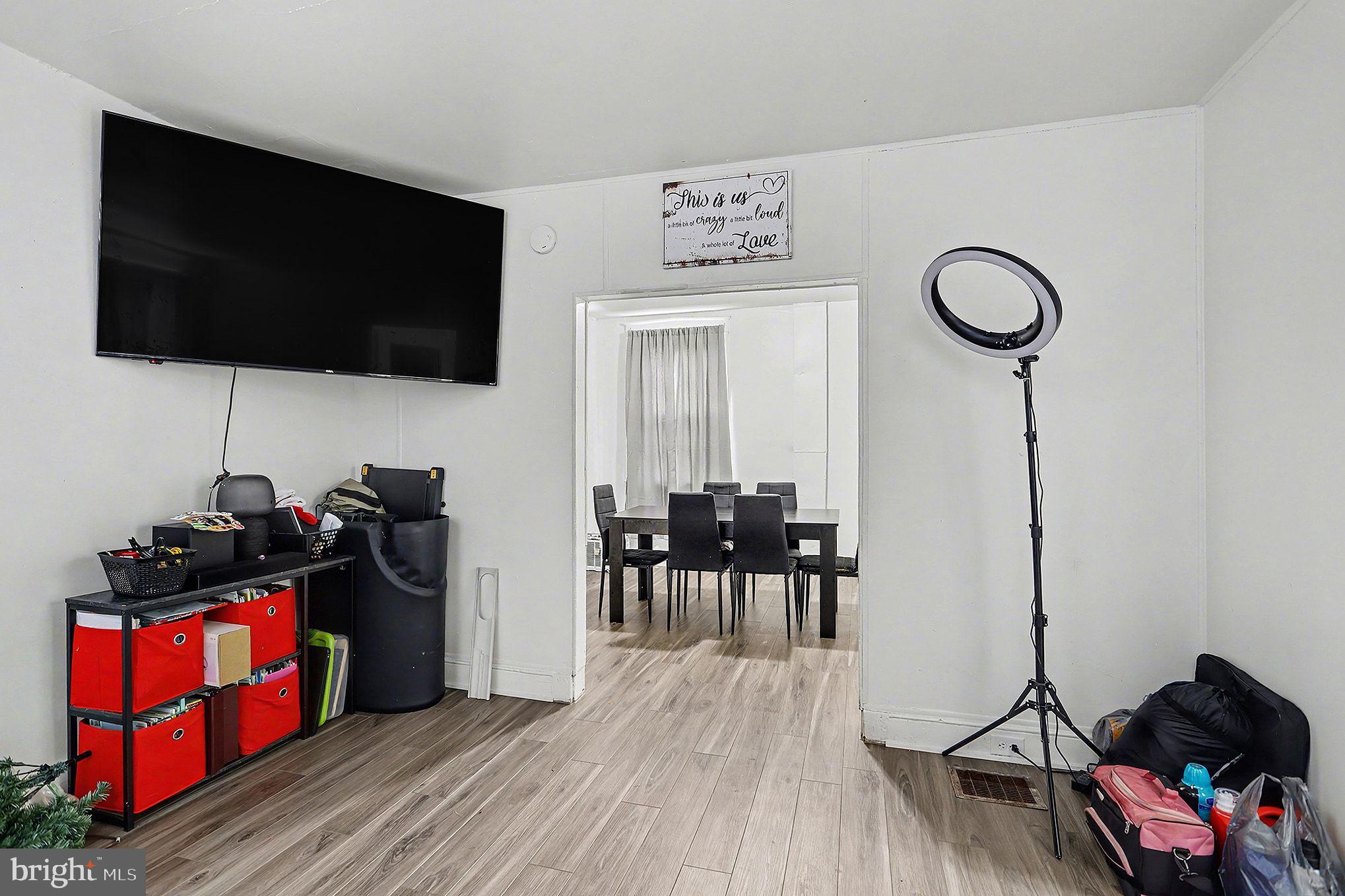 124 South Arch Street Lancaster, PA 17603 - Photo 10 of 34 a living room with furniture and a flat screen tv