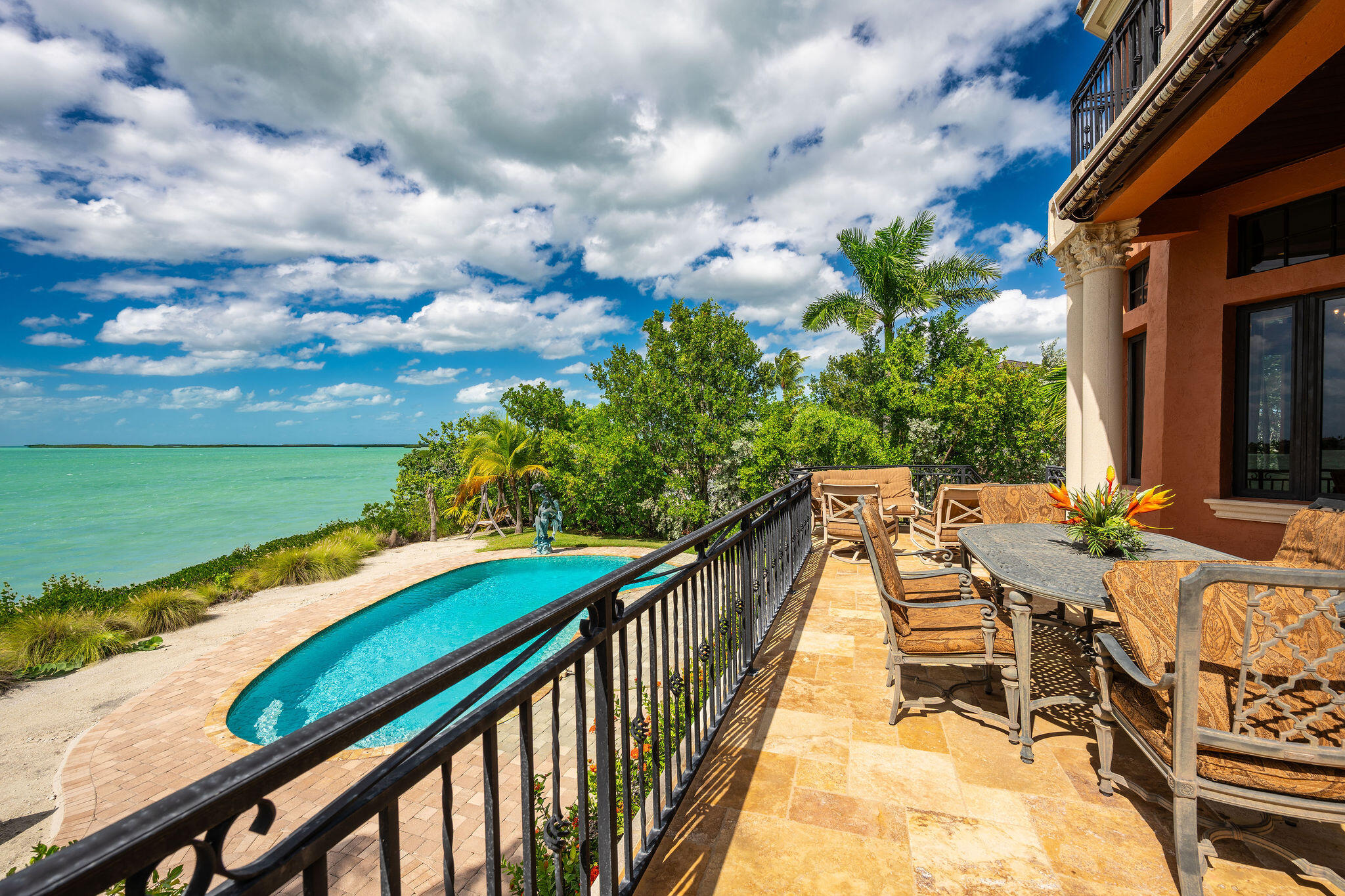 30 Cannon Royal Drive Shark Key, FL 33040 - Photo 41 of 48 SLIDING GLASS DOORS OPEN TO LARGE DECK