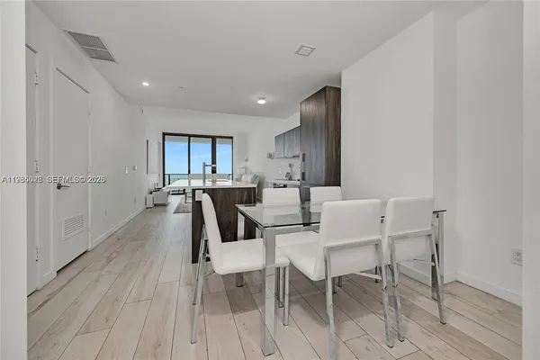 a view of a dining room with furniture