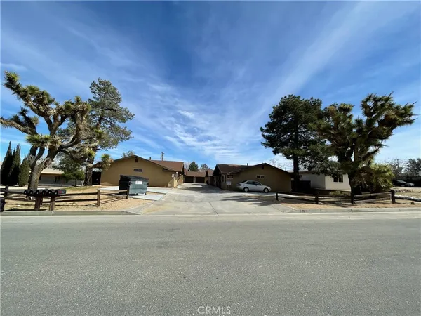 a view of street with houses
