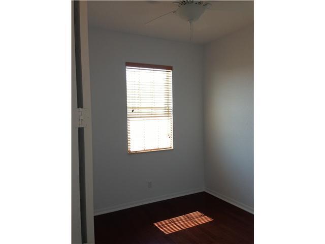 4127 Sandy Spit Lane Jupiter, FL 33458 - Photo 16 of 24 a room with a window