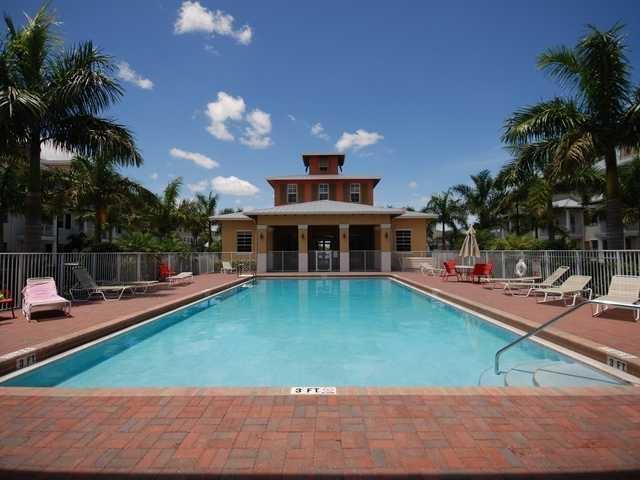 4127 Sandy Spit Lane Jupiter, FL 33458 - Photo 19 of 24 a view of a house with swimming pool