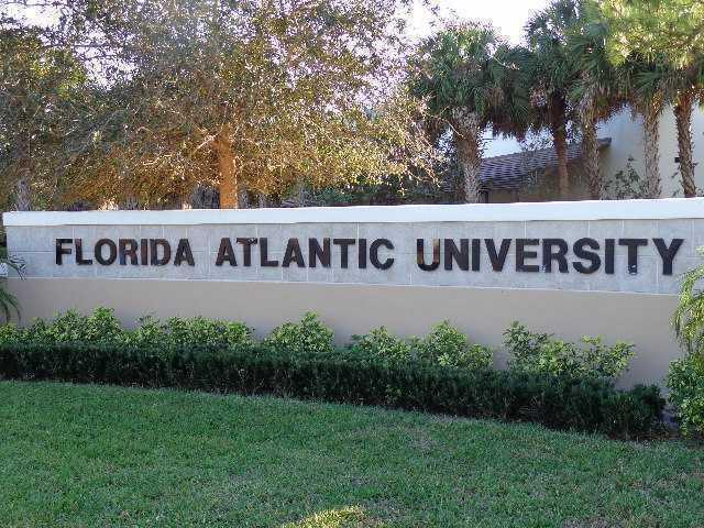 4127 Sandy Spit Lane Jupiter, FL 33458 - Photo 24 of 24 a view of outdoor space with garden and trees