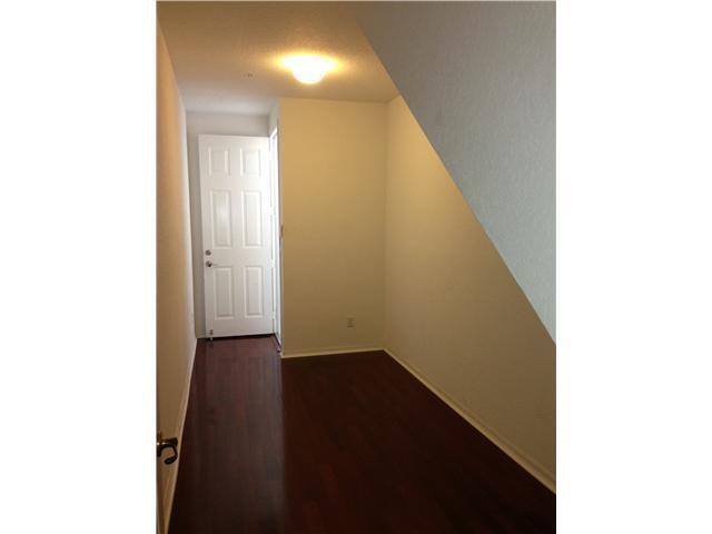 4127 Sandy Spit Lane Jupiter, FL 33458 - Photo 5 of 24 a view of a hallway with wooden floor