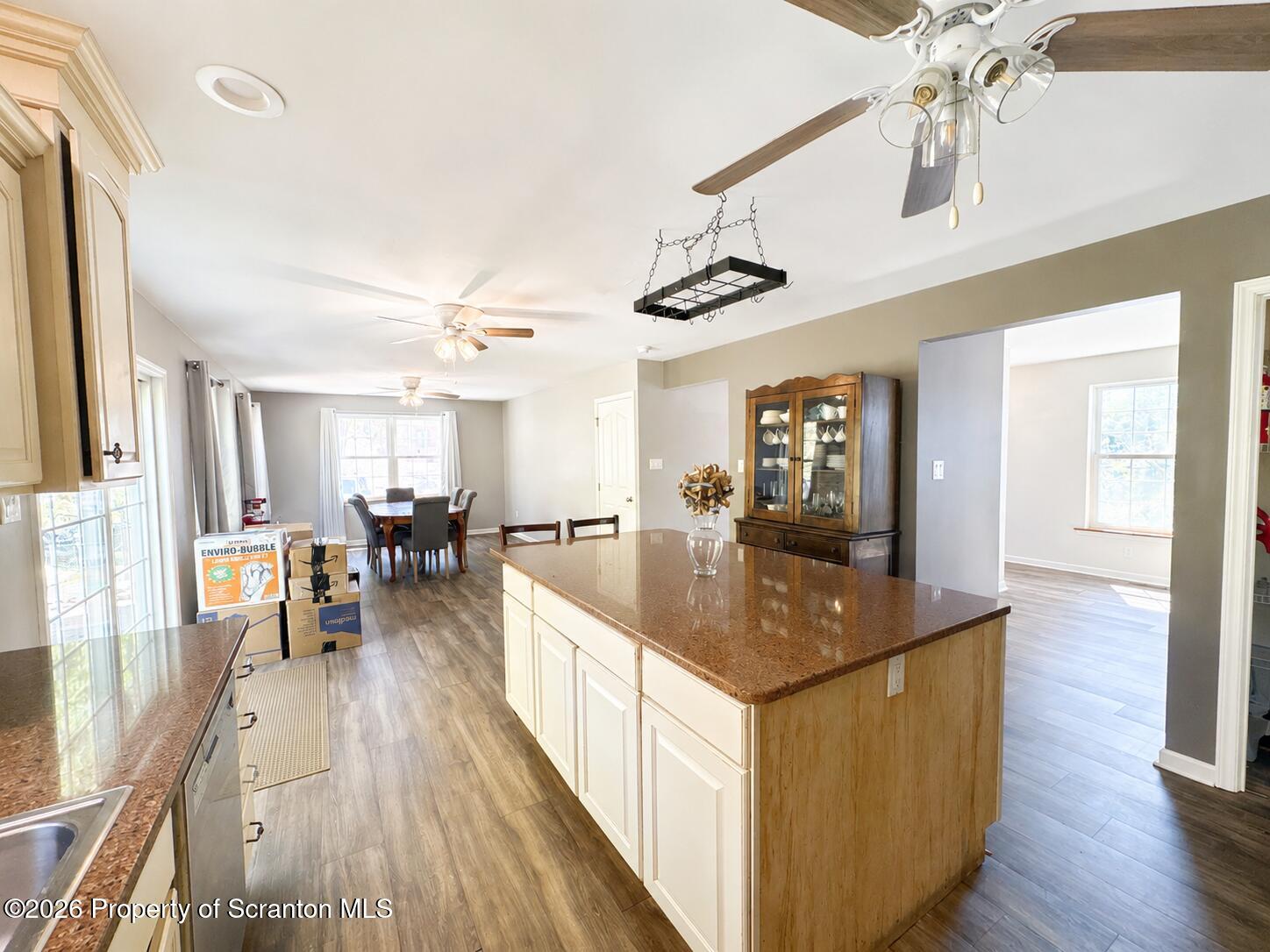 155 Baylor Road Nicholson, PA 18446 - Photo 26 of 53 a very nice looking dining room with wooden floor and a chandelier