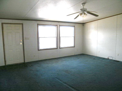 1043 Lick Ridge Road Northeast Check, VA 24072 - Photo 2 of 11 an empty room with a empty space and windows