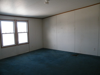 1043 Lick Ridge Road Northeast Check, VA 24072 - Photo 5 of 11 an empty room with a empty space and windows