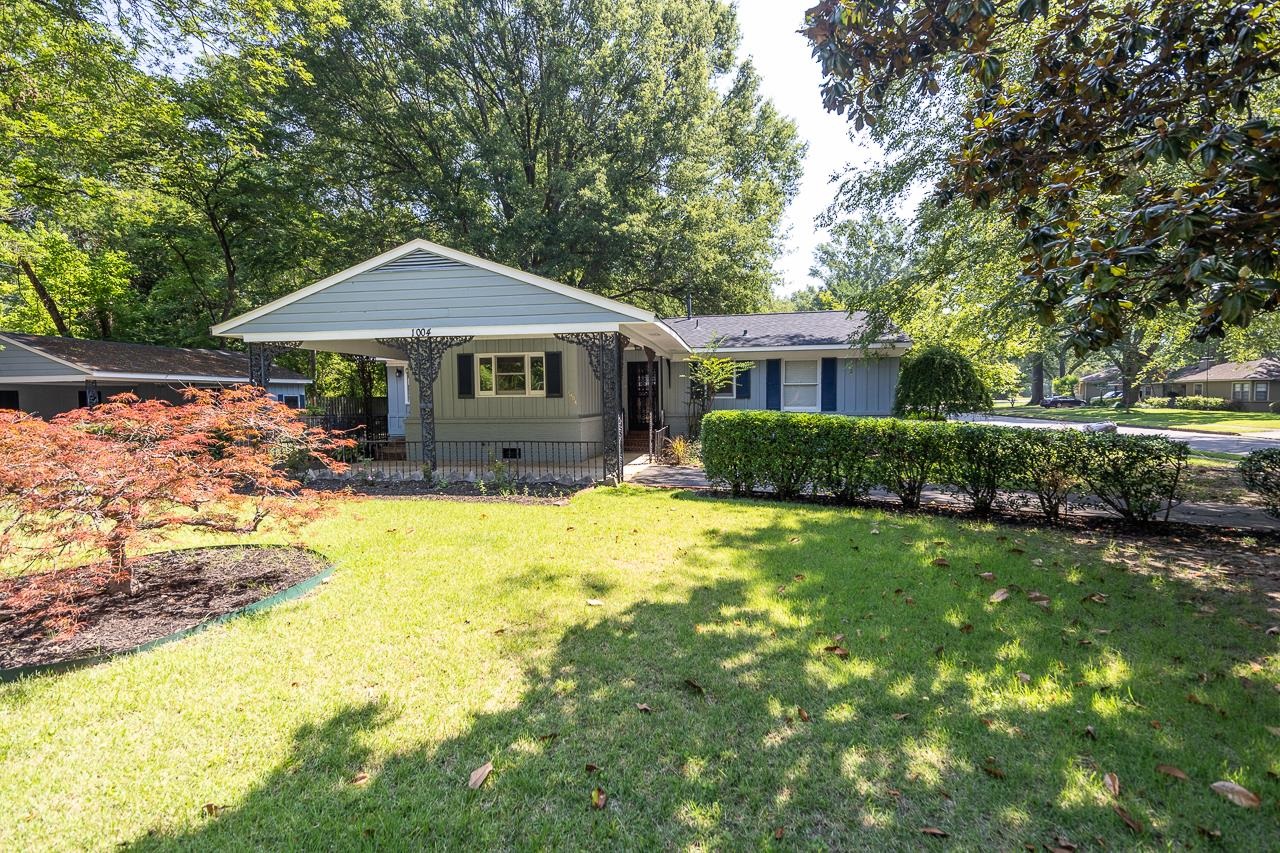 1004 South Perkins Road Memphis, TN 38117 - Photo 2 of 19 a front view of a house with yard and green space