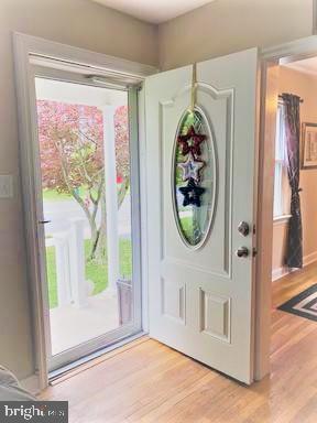 210 Kuser Road Hamilton, NJ 08619 - Photo 12 of 41 Enter light filled LR through new storm door.