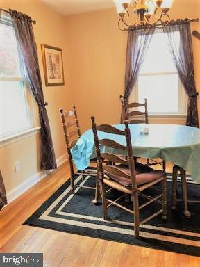 210 Kuser Road Hamilton, NJ 08619 - Photo 15 of 41 Light filled formal dining room & hardwood floors.
