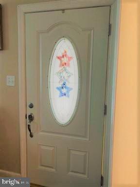 210 Kuser Road Hamilton, NJ 08619 - Photo 16 of 41 Beautiful designer oval glass front door.