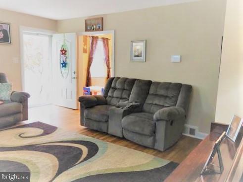 210 Kuser Road Hamilton, NJ 08619 - Photo 19 of 41 LR w/several sofas, closet, lg.Television & piano.
