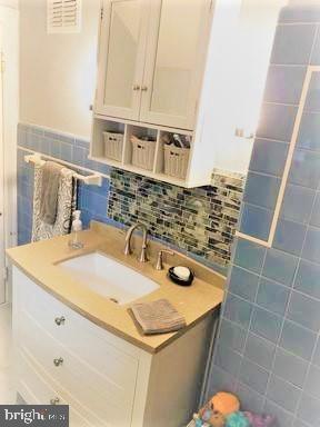 210 Kuser Road Hamilton, NJ 08619 - Photo 33 of 41 Full bath has new marble like fl tile & new toilet