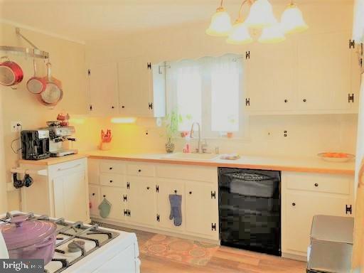 210 Kuser Road Hamilton, NJ 08619 - Photo 10 of 41 Updated kitchen w/white cabinets & subway tile.