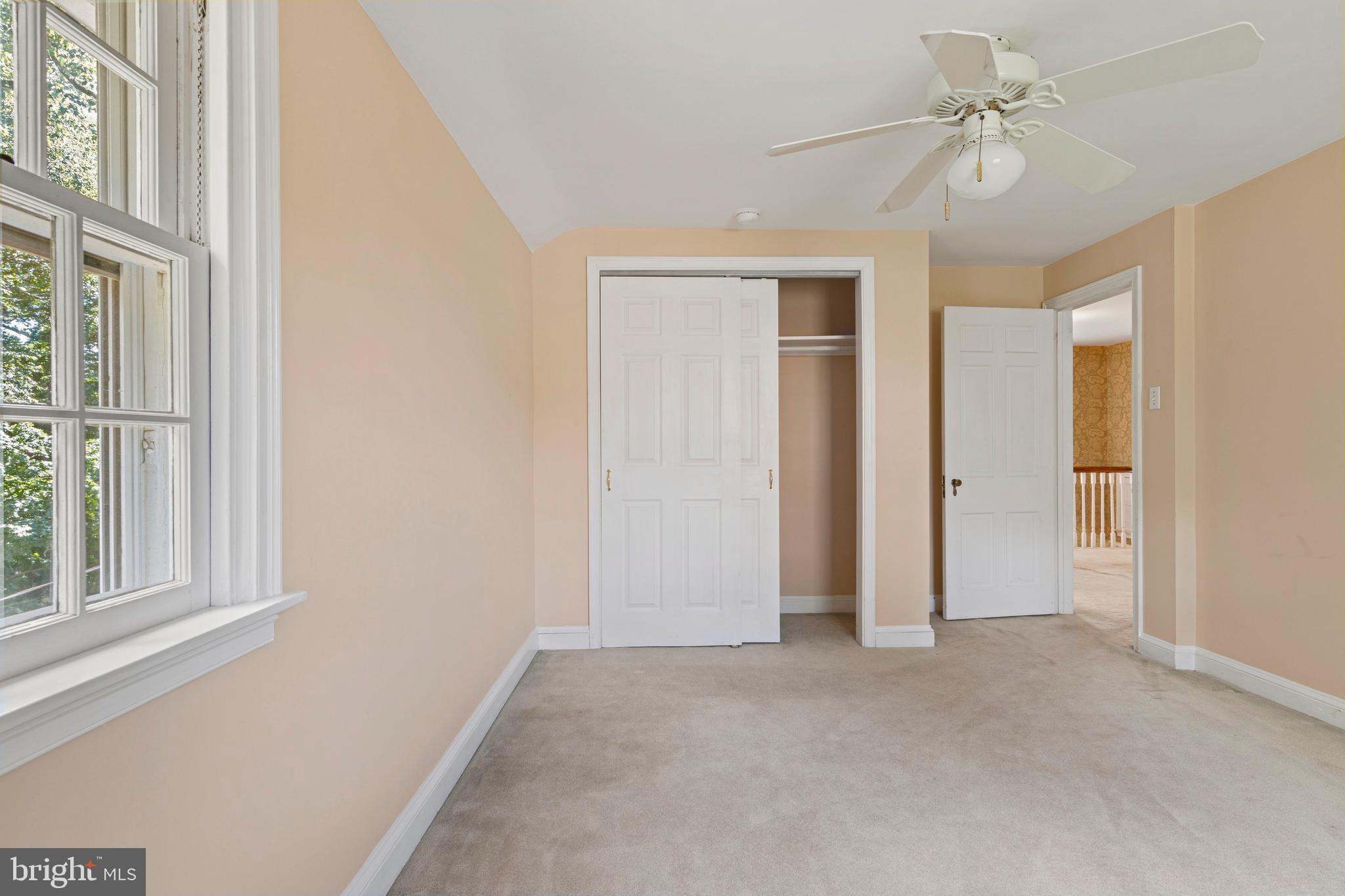 5020 Dermond Road Drexel Hill, PA 19026 - Photo 32 of 39 an empty room with windows and ceiling fan