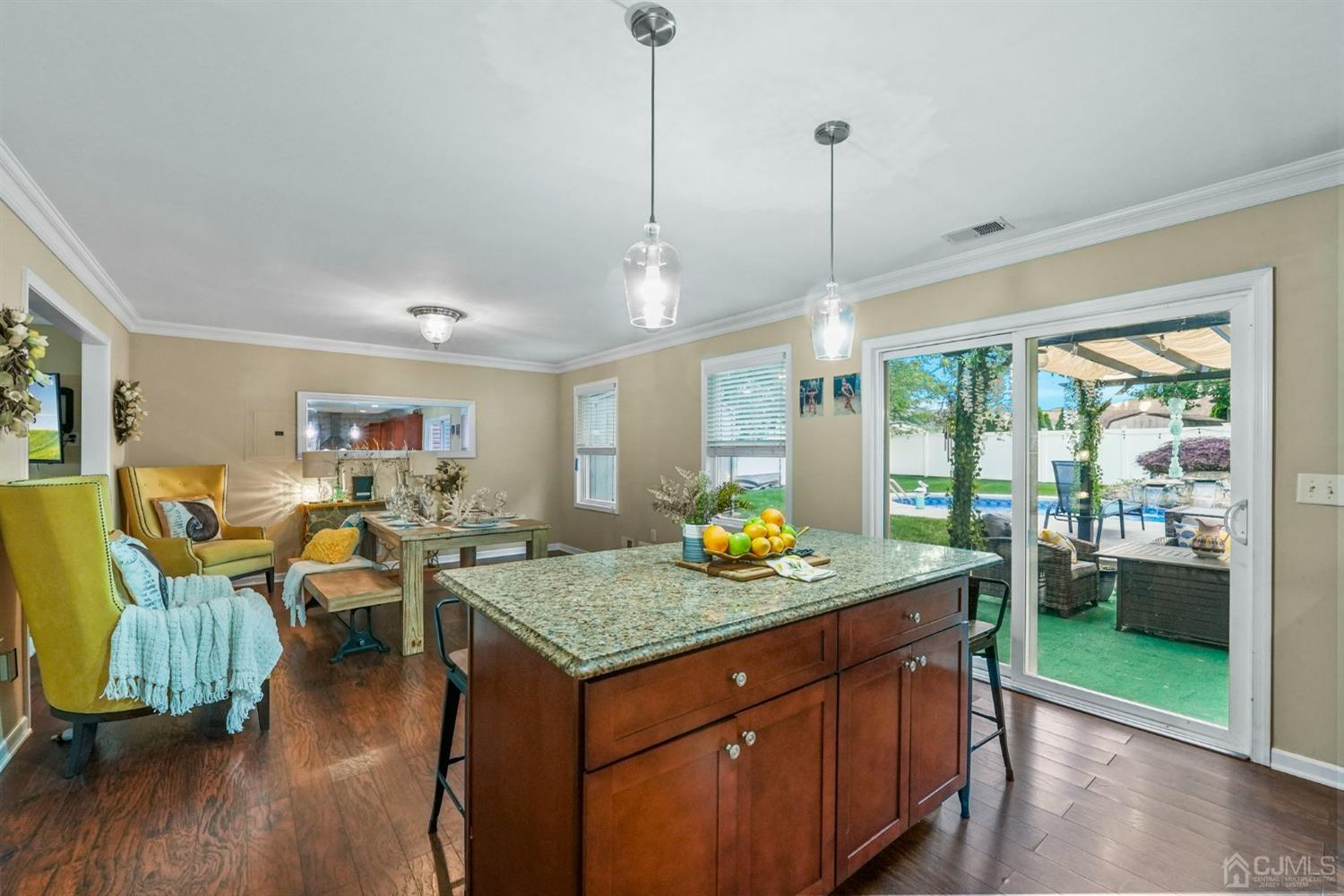 14 Baxter Road Edison, NJ 08817 - Photo 14 of 39 a kitchen that has a table and chairs in it