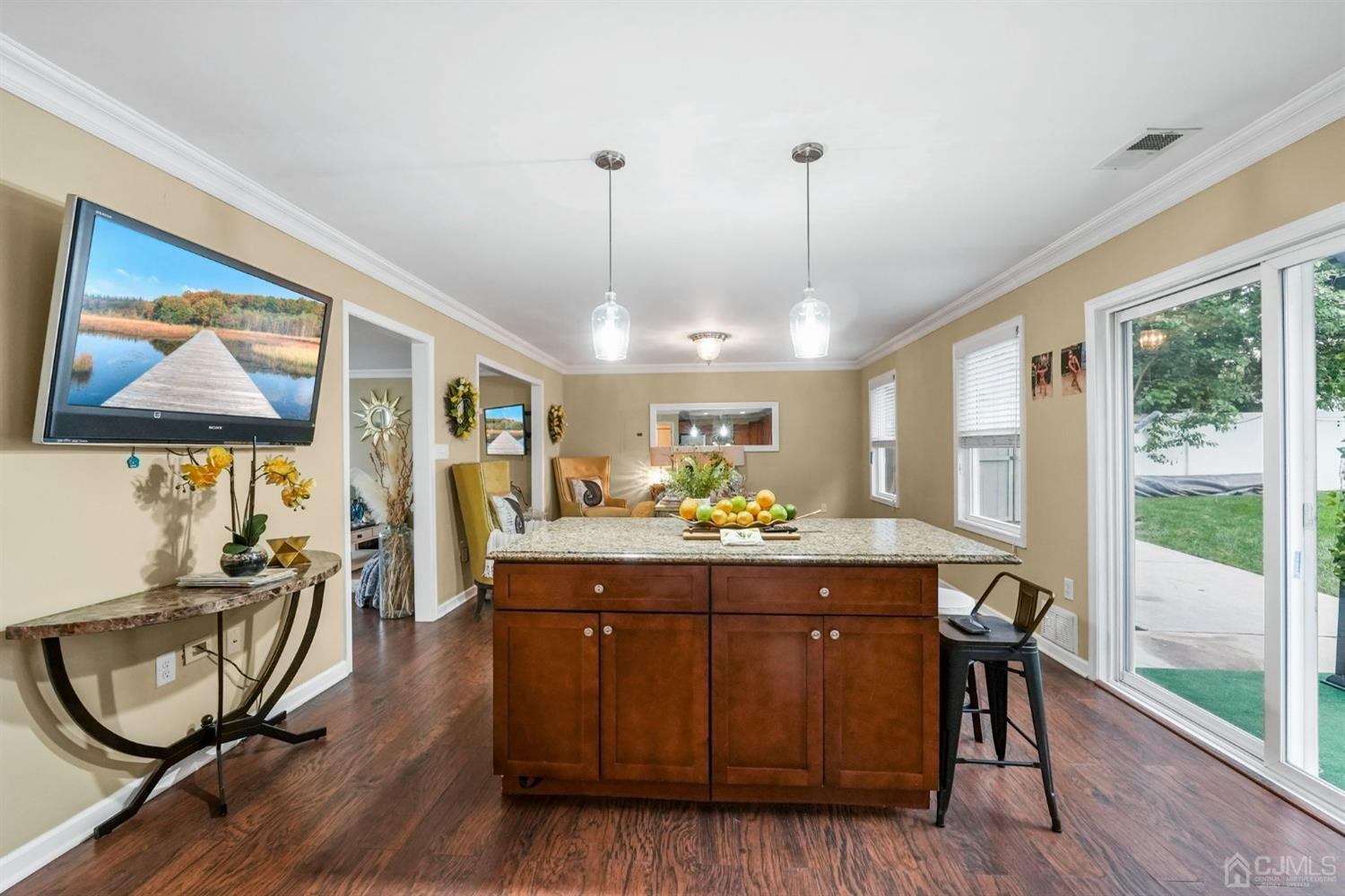 14 Baxter Road Edison, NJ 08817 - Photo 15 of 39 a view of a dining room with furniture window and outside view