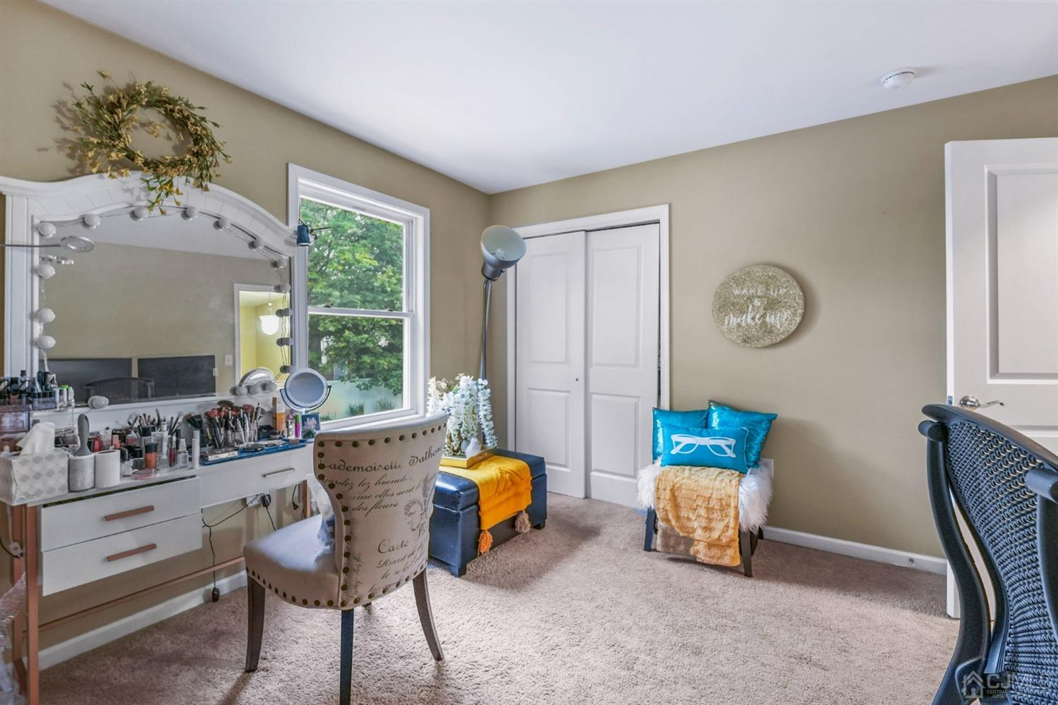 14 Baxter Road Edison, NJ 08817 - Photo 24 of 39 a living room with furniture and a large window