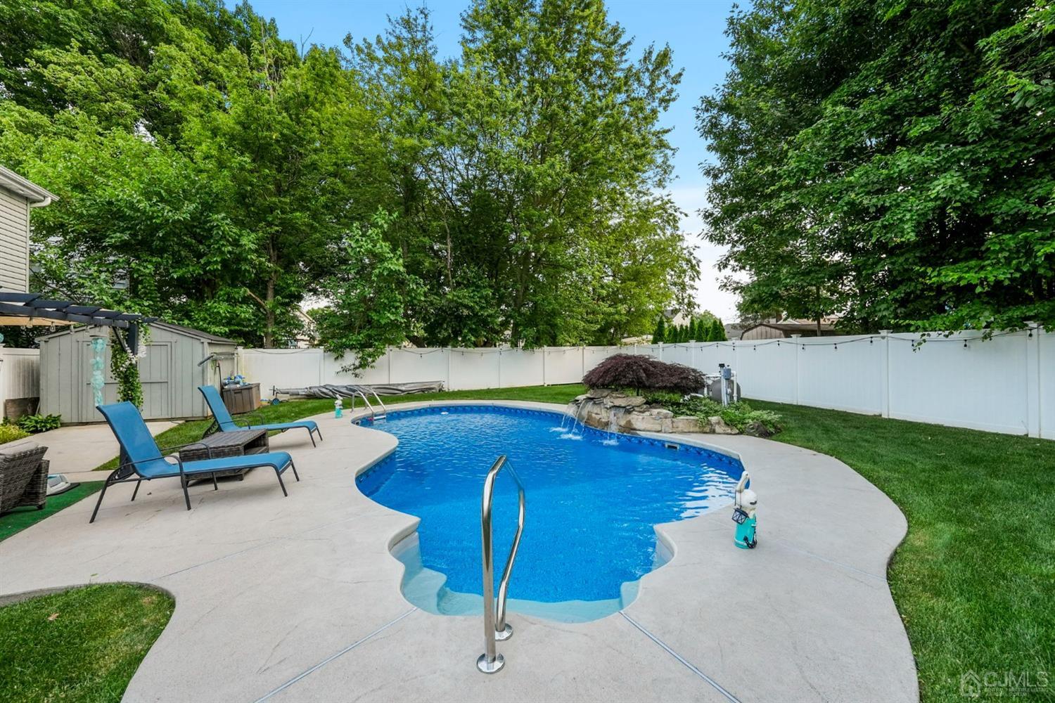 14 Baxter Road Edison, NJ 08817 - Photo 32 of 39 an outdoor space with pool and furniture