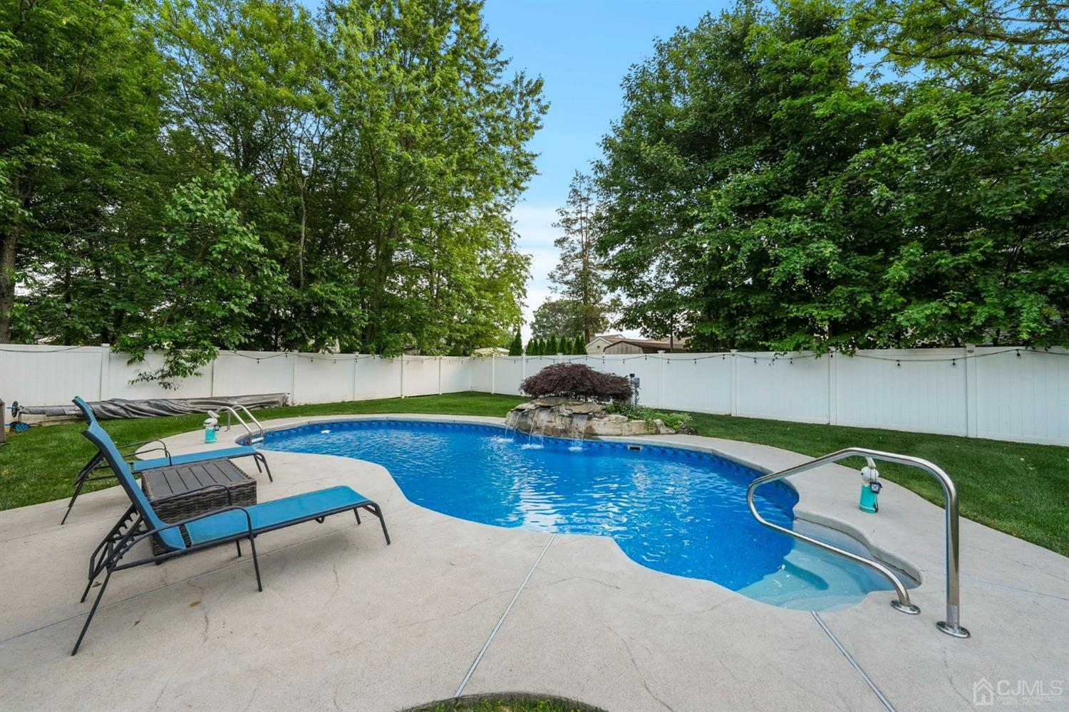 14 Baxter Road Edison, NJ 08817 - Photo 33 of 39 a view of swimming pool with chairs