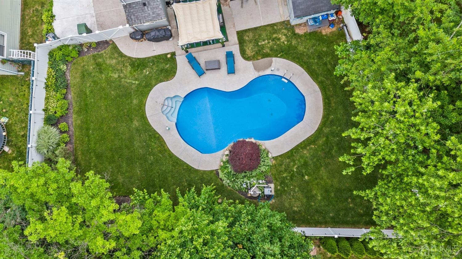 14 Baxter Road Edison, NJ 08817 - Photo 36 of 39 an aerial view of a house with garden space and swimming pool