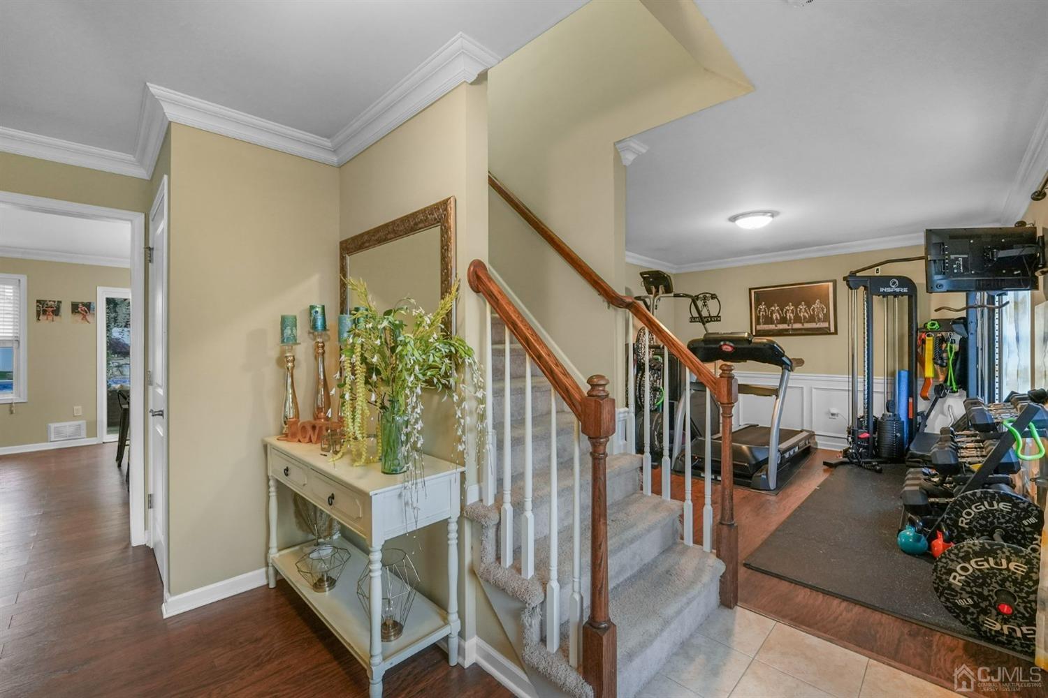 14 Baxter Road Edison, NJ 08817 - Photo 7 of 39 a view of entryway livingroom and hall with wooden floor