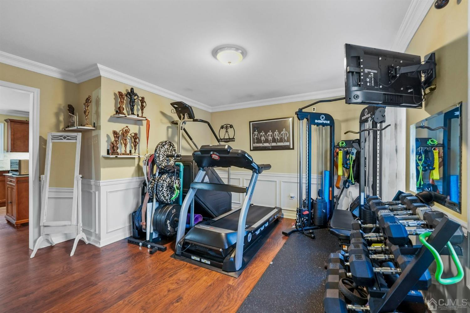 14 Baxter Road Edison, NJ 08817 - Photo 8 of 39 a view of a room with gym equipment