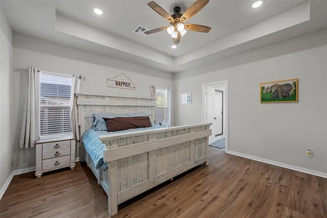a utility room with cabinets washer and dryer