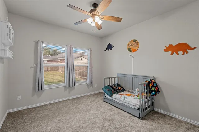 a bathroom with a double vanity sink and mirror with shower